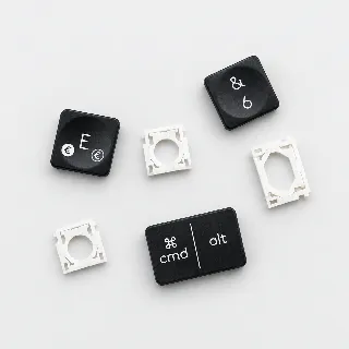 Graphitfarbene Logitech-MX-Keys-Ersatztasten mit weißen Tastenmechaniken